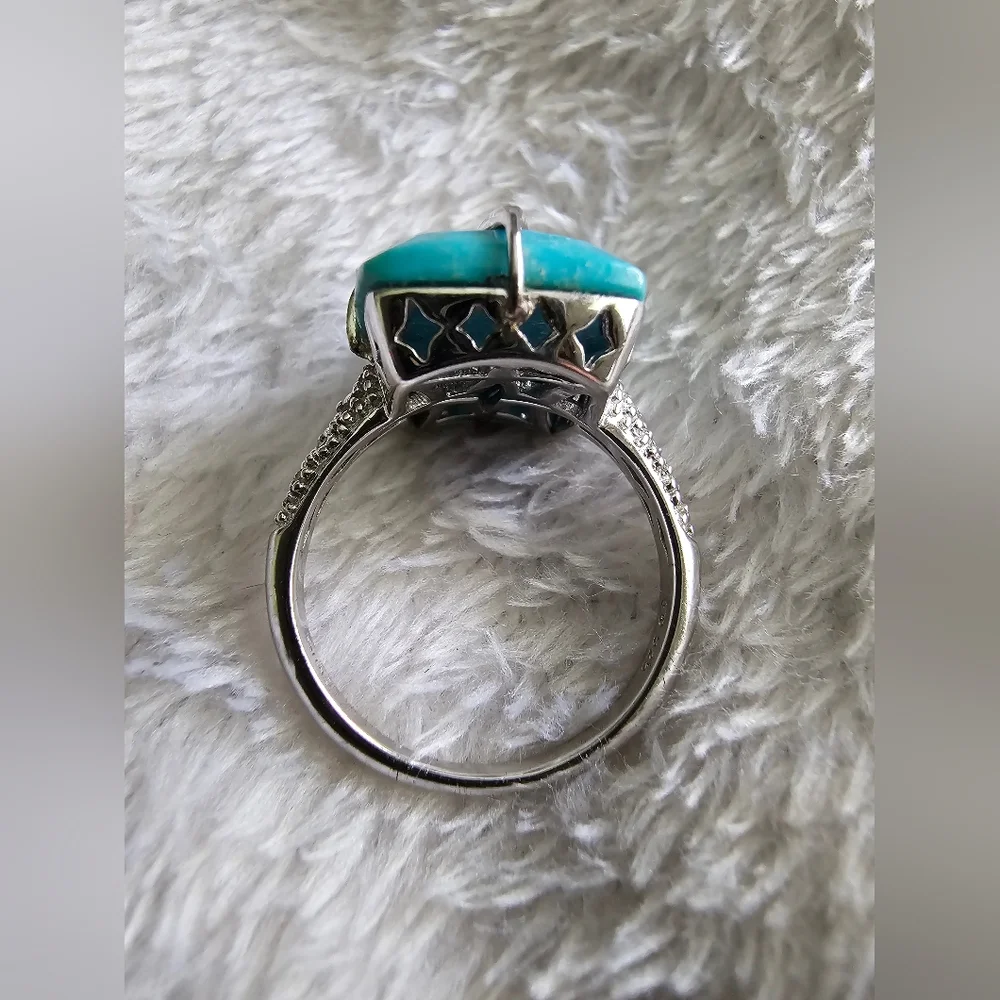 Turquoise and white topaz silver ring
